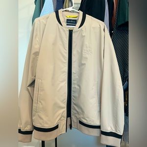 Psycho Bunny size L bomber jacket. Brand new. Light weight, comfortable